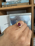 Token Faceted Ruby Ring